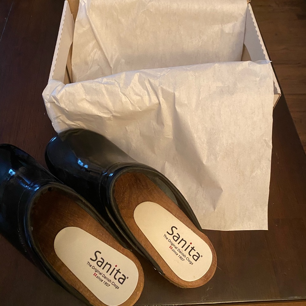 Sanita black patten clogs . New